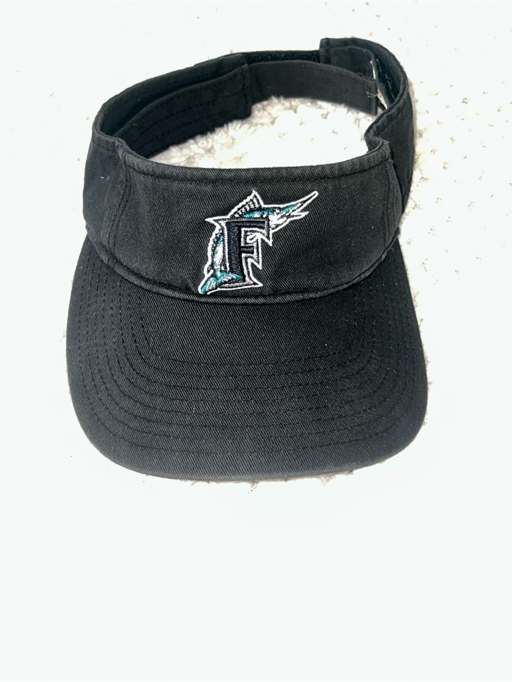 Genuine Merchandise Black Baseball Visor with Team Patch